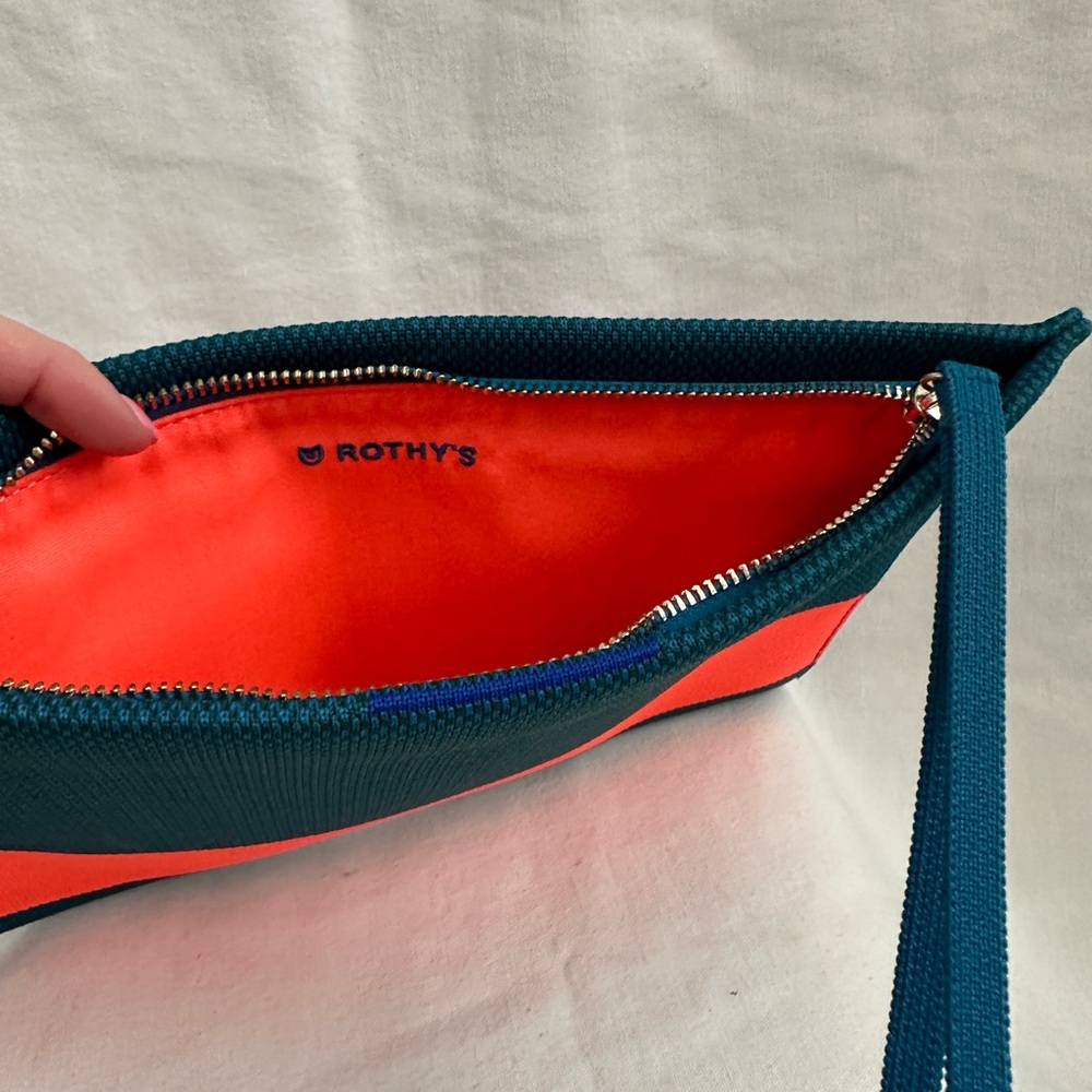 Rothy’s The Essential Pouch Deep Teal DISCONTINUED rare find. New w/ packaging.